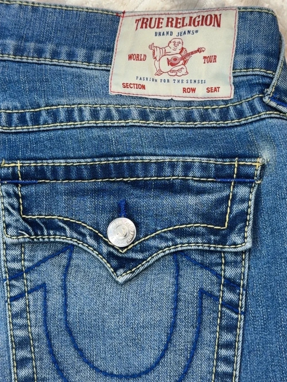 True Religion Men's Light Blue Denim Jeans with Signature Pocket Stitch